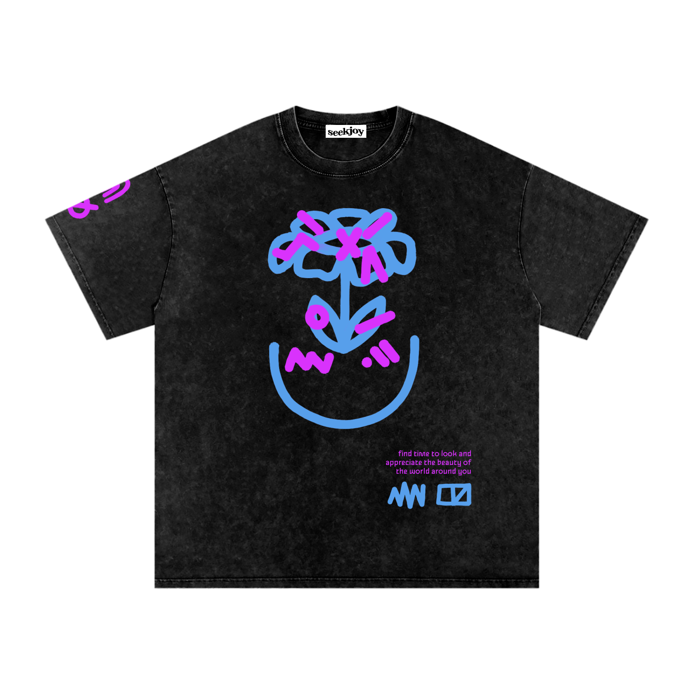 Perception tee laid flat in washed black, blue and pink scribbled flower above a smile